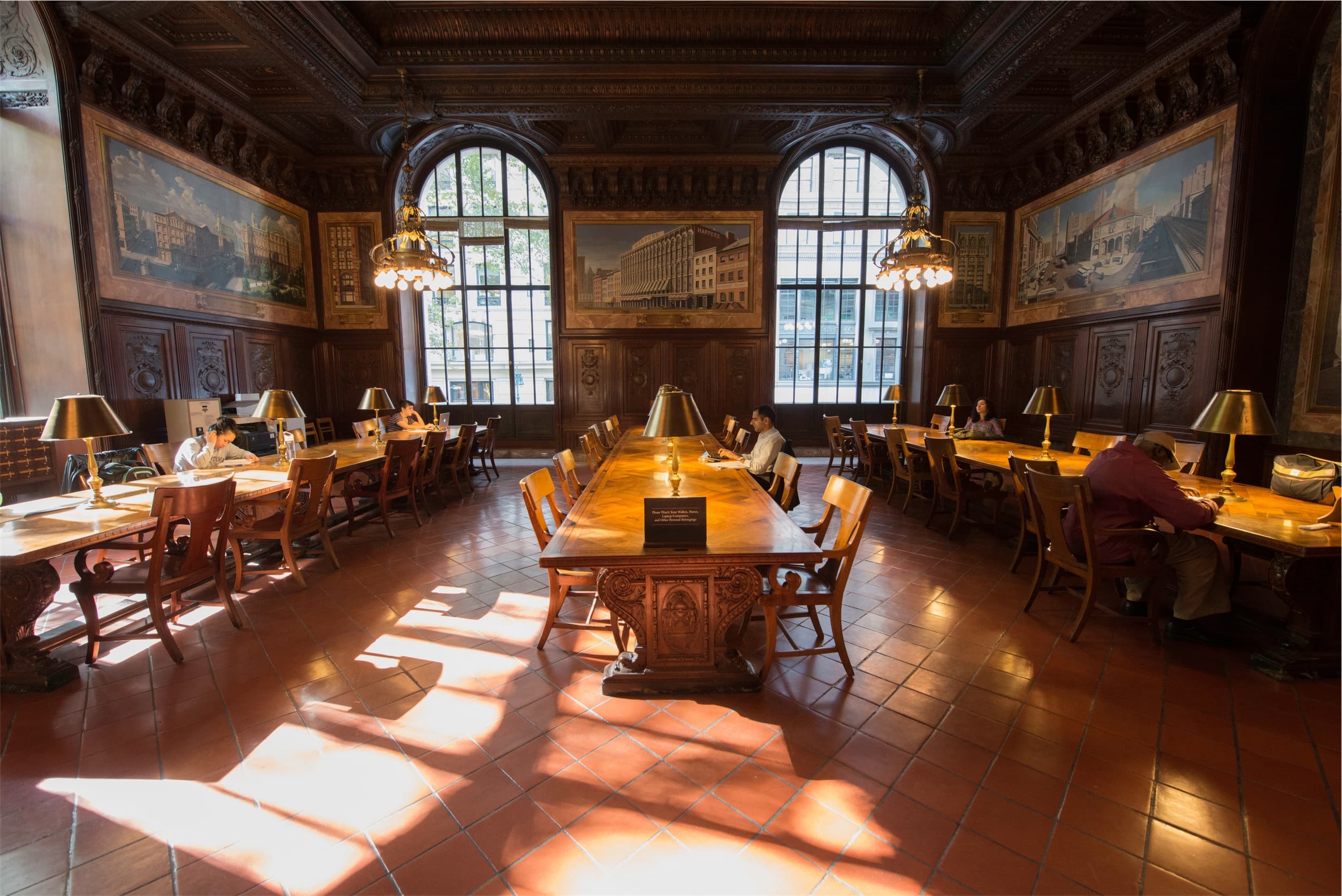 Warm wood-paneled library interior near the South Natick Law office